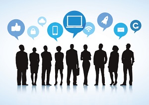 This is a picture of people chatting about electronics.