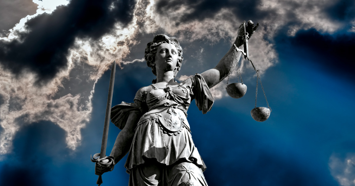 Lady justice with storm clouds