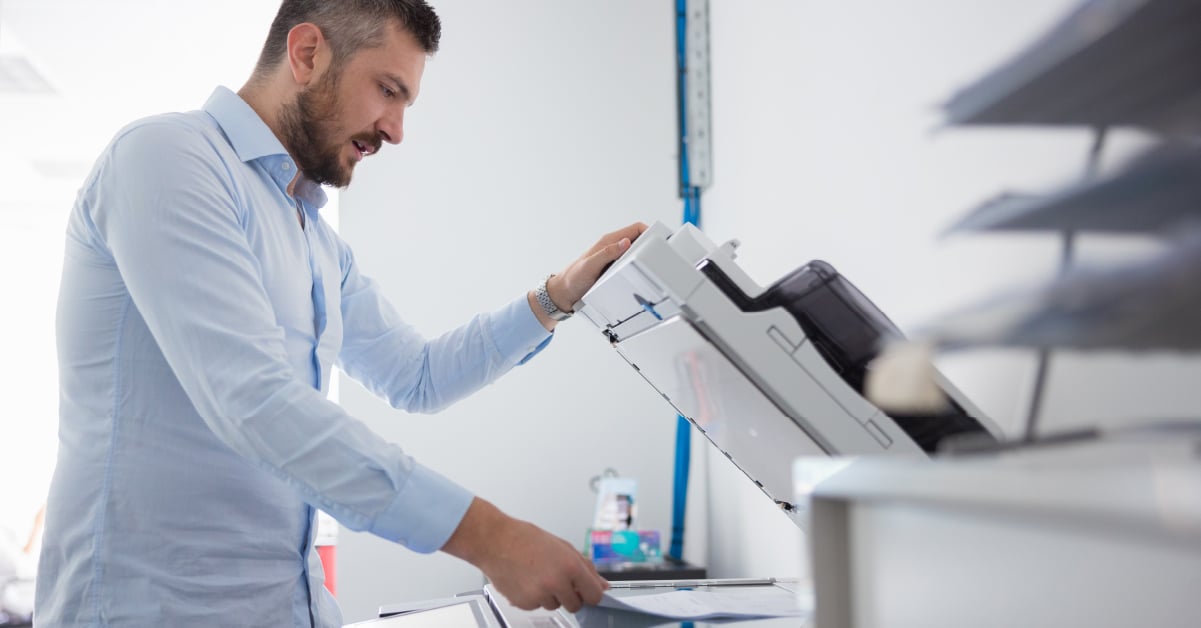 Employee using copier