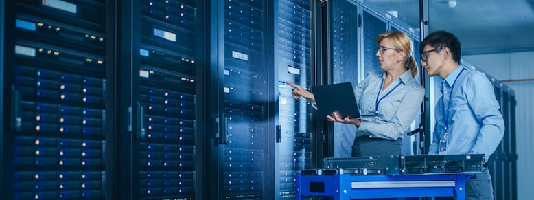 IT Network Specialists working in server room