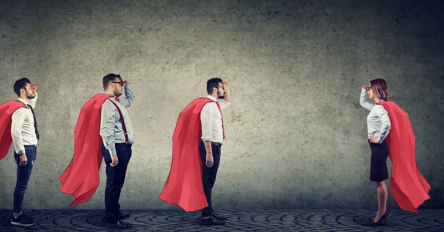 A group of office workers in red super hero capes, empowered to choose the tools that worked best for each department.