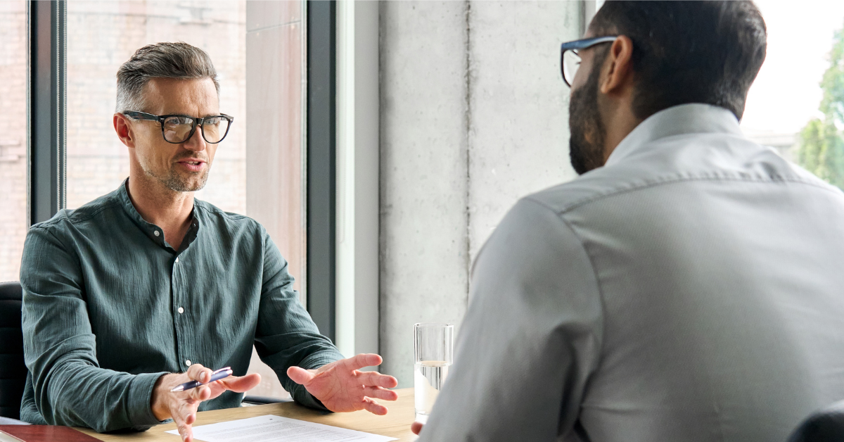 Business owner meeting with managed service provider. 