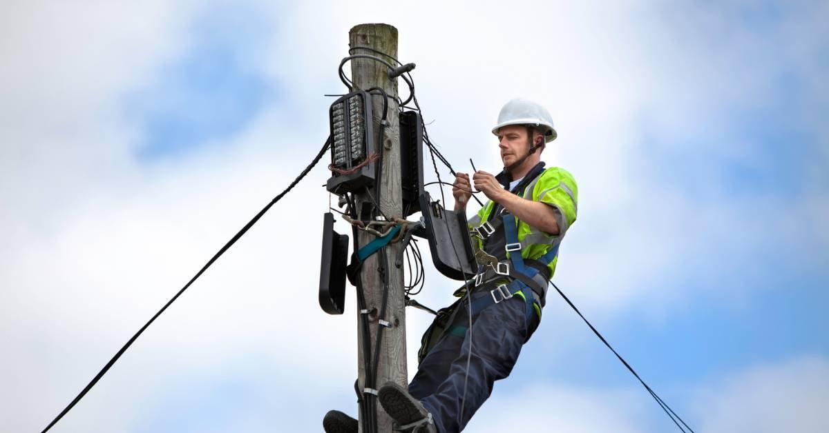 Telephone repairman working on a POTS line.