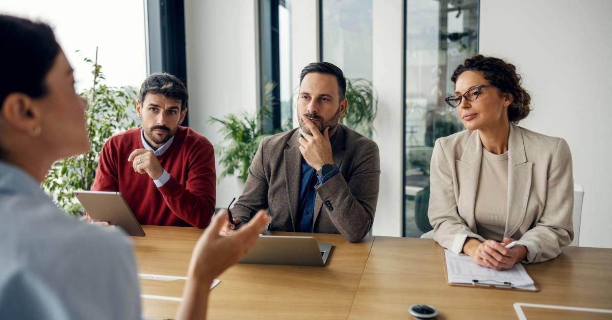 Three stakeholders interview a potential managed print services provider.