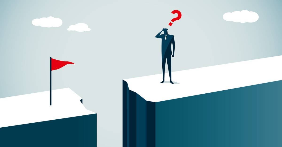 A gap separates a business leader from his goal. 