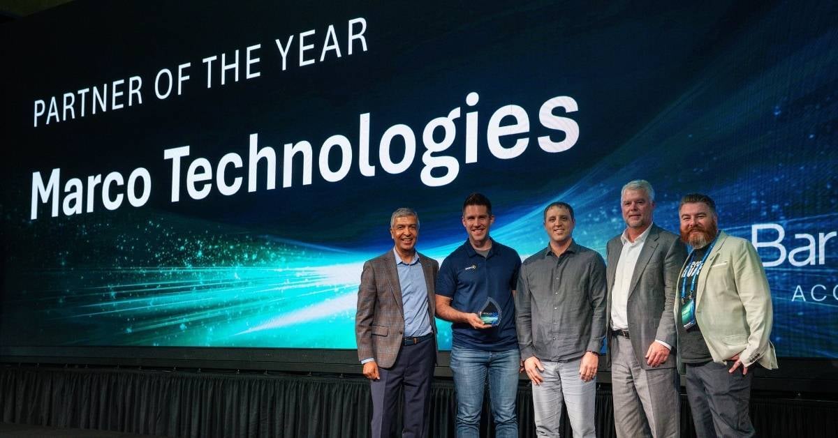 Members of Marco's IT and cybersecurity leadership accept the Partner of the Year award at Barracuda Sales Kickoff.