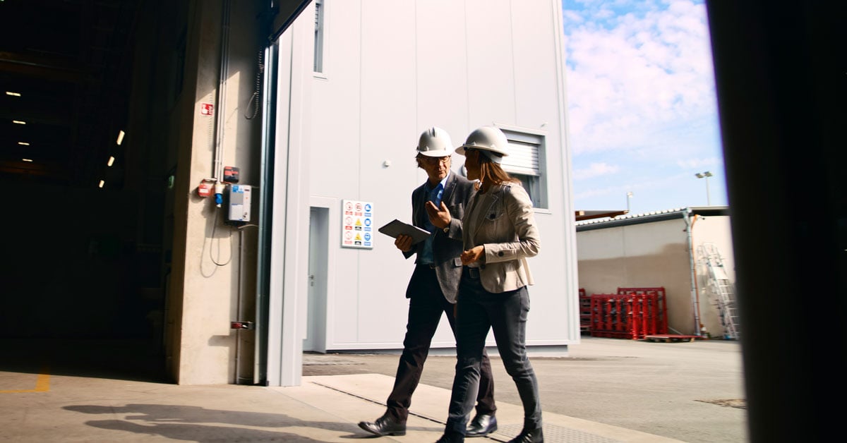 people-walking-into-manufacturer