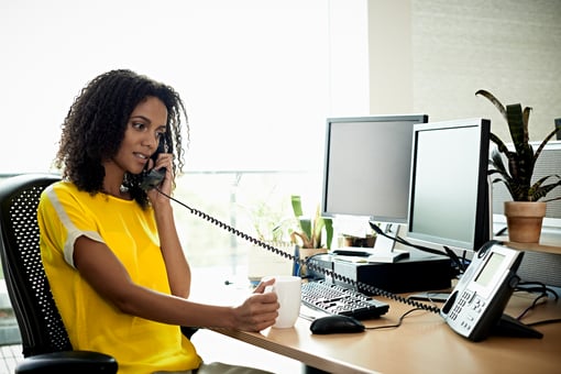 Business woman using phone