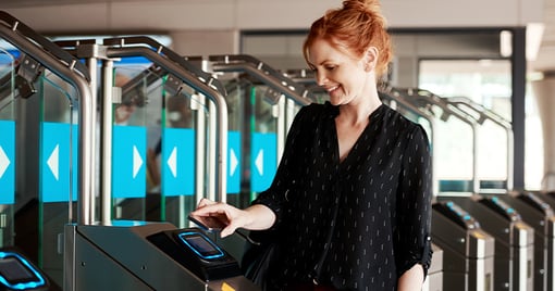 Woman using card scanning security system