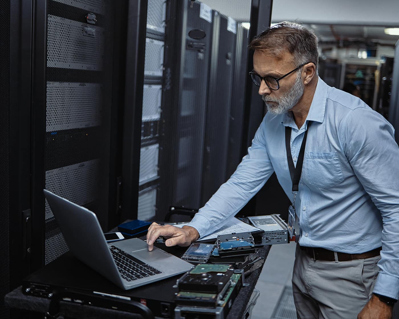 it-technician-working-on-server-hardware-in-data-center