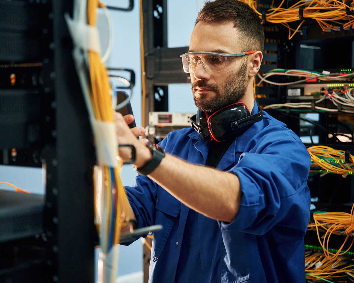 man-installing-phone-system-with-wiring