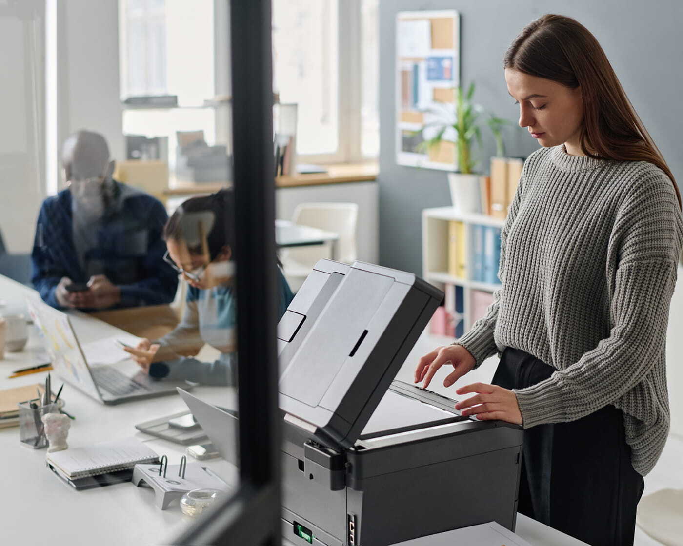 office-atmosphere-with-woman-at-printer