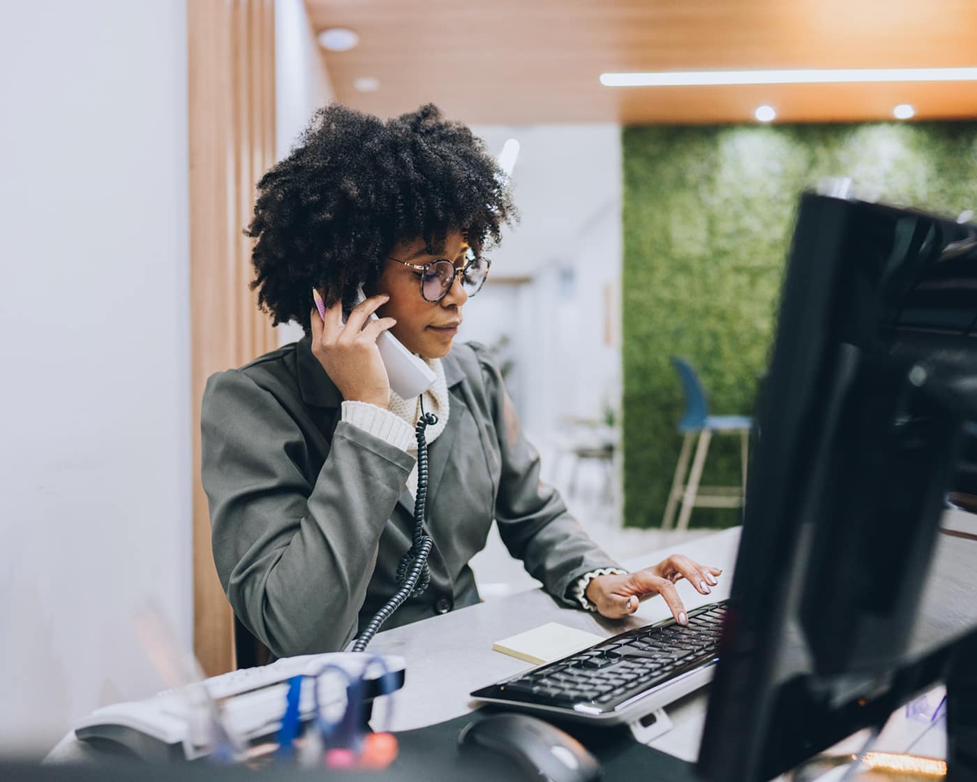 woman-on-office-phone-slight-frustration
