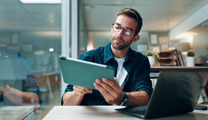 rfp-evaluator-looking-at-tablet
