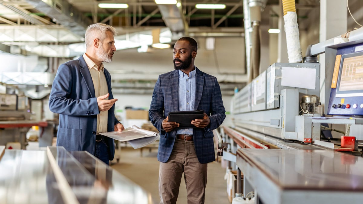 factory-manager-discussing-print
