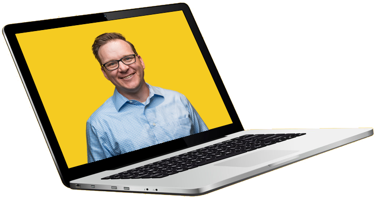 smiling individual on laptop screen