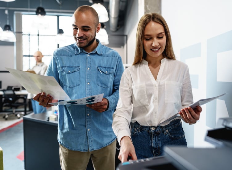 confident-employee-at-printer