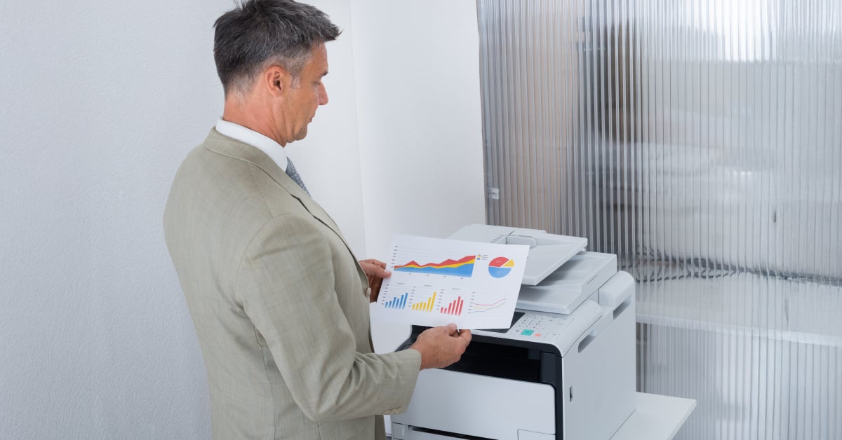 Employee testing printer