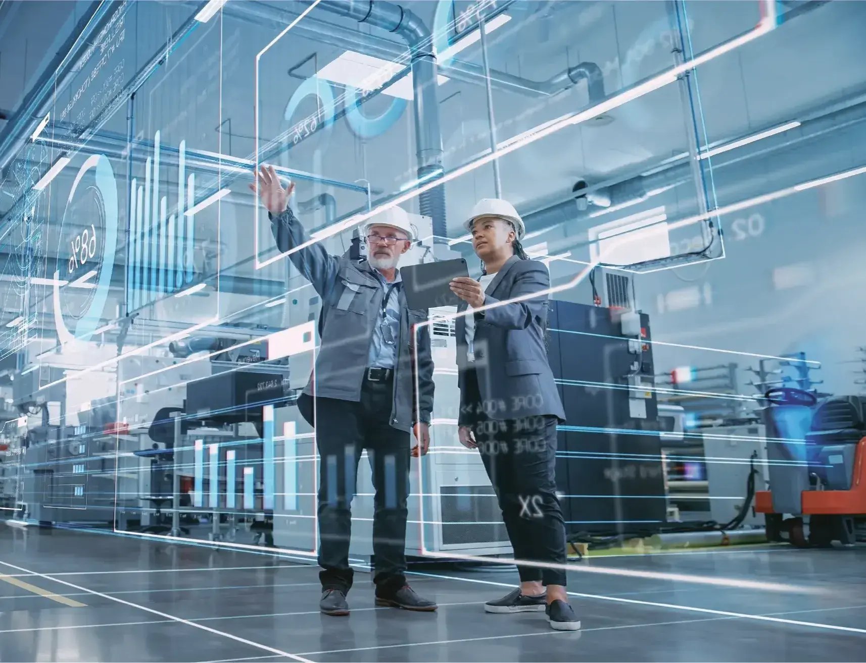 Two manufacturing IT leaders discussing machine analytics.