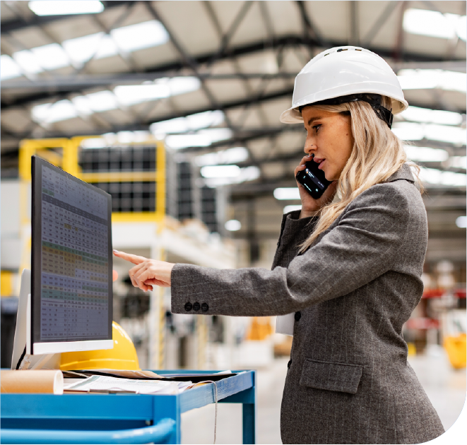 An employee uses an updated phone system for her manufacturing business that allows emploeyes to communicate better in real time.