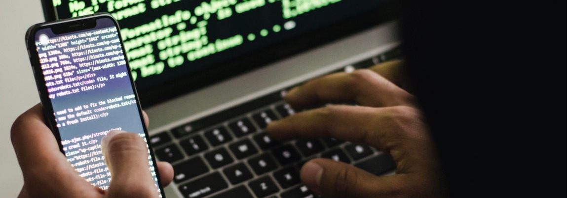 hacker committing internet crime