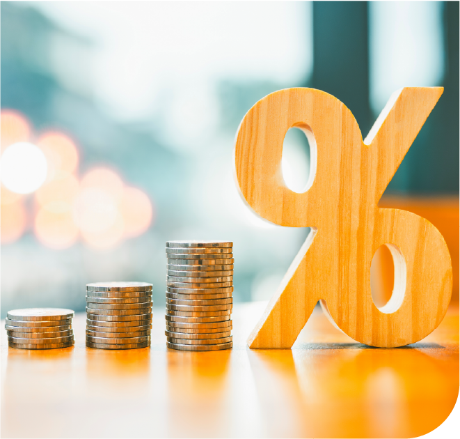 A growing stack of coins next to a wooden percentage sign represents the amount of money businesses could save with managed print services over time.