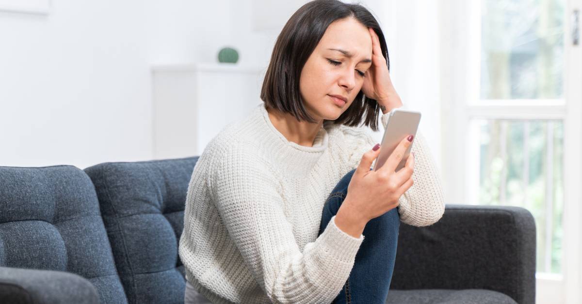 Frustrated patient using old healthcare phone technology. 